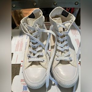 Used White Counter Climate high top Converse in size M5/W7.